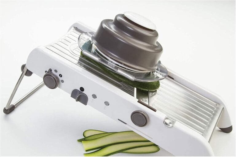 pl8 by progressive mandoline slicer, multiple adjustable thicknesses, julienne and waffle cut, slicing ramp, non skid feet, vegetable slicer, saftey hand guard5